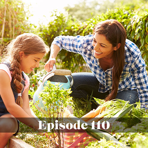 Starting a community garden, teacher helping young girl plant in the community garden