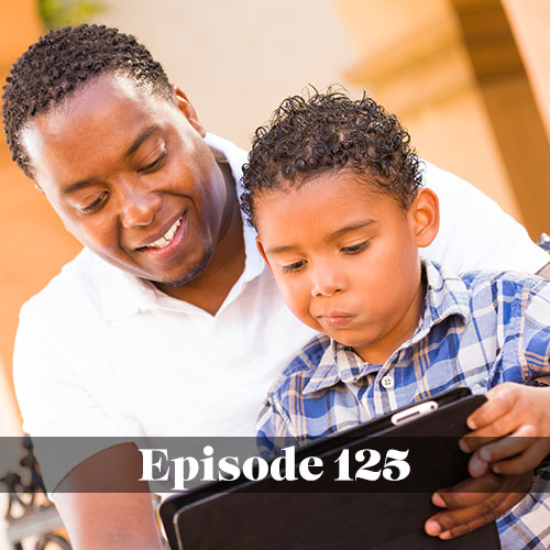 Limiting screen time in schools, photo of dad and his son on a tablet together